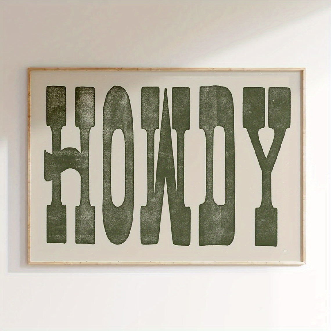 Howdy Canvas Wall Art, Bold Green Western Typography on a Neutral Background for Living Room — artwork and room preview