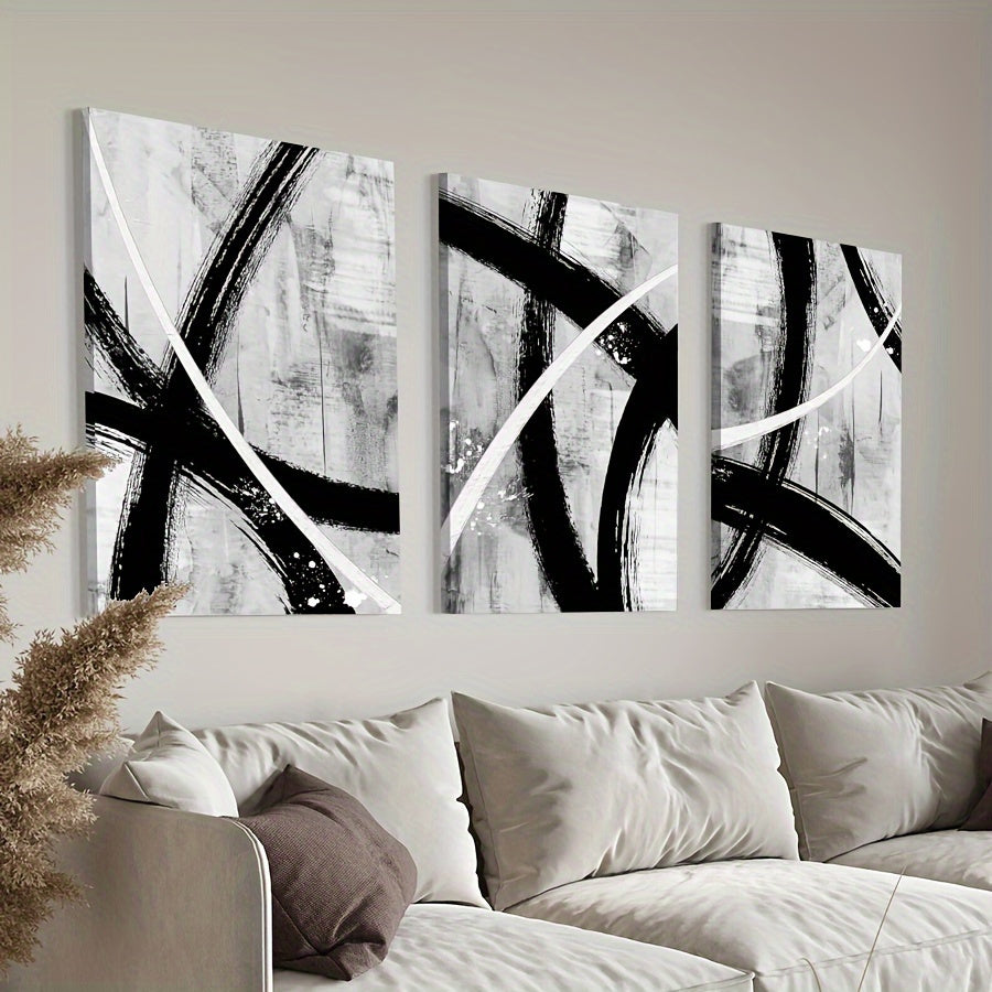 Black and White Abstract Canvas Wall Art Set of 3, Bold Sweeping Lines for Modern Living Room — artwork and room preview