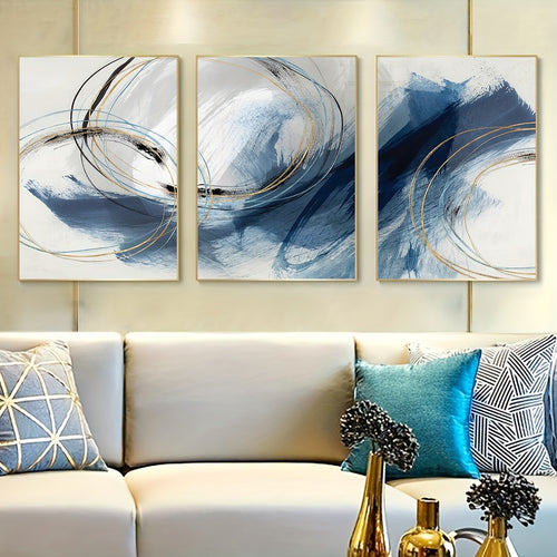 Blue Abstract Canvas Wall Art Set of 3, Flowing Lines and Pale Gold Accents for Modern Living Room — artwork and room preview