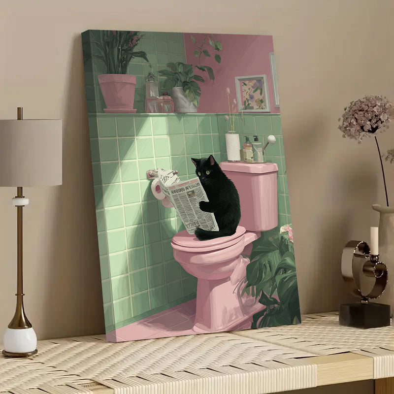 Funny Black Cat Canvas Wall Art, Reading a Newspaper on a Pink Toilet in a Mint Green Bathroom — artwork and room preview