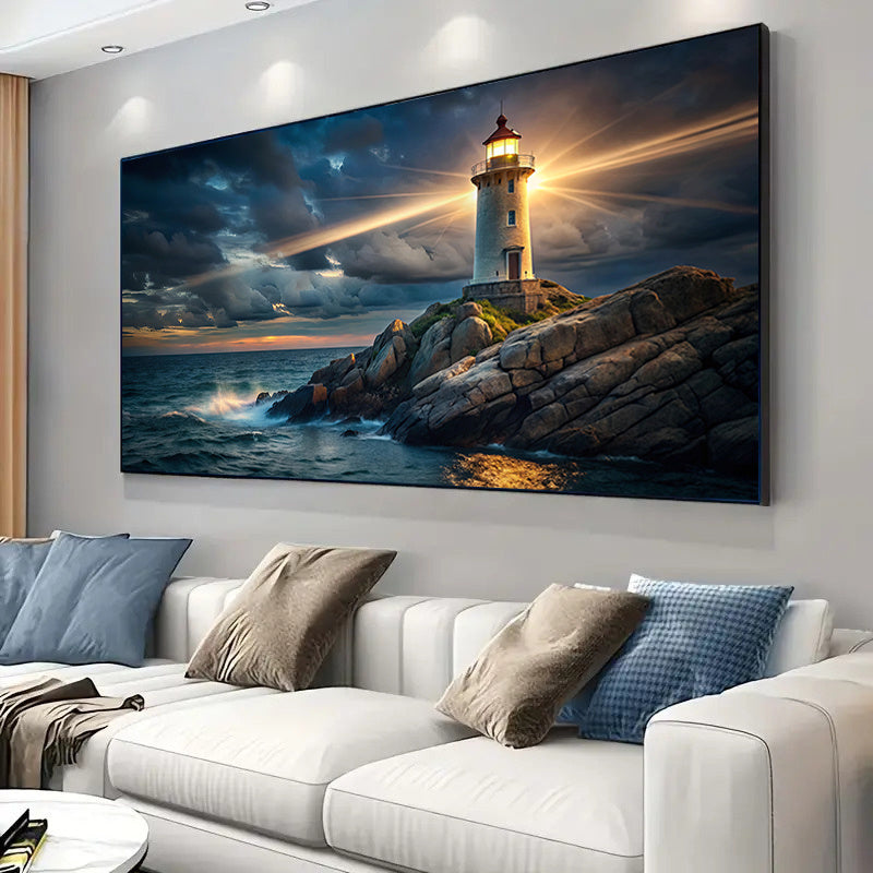 Lighthouse Canvas Wall Art, Golden Light over a Dramatic Blue Ocean Sunset for Coastal Living Room — artwork and room preview