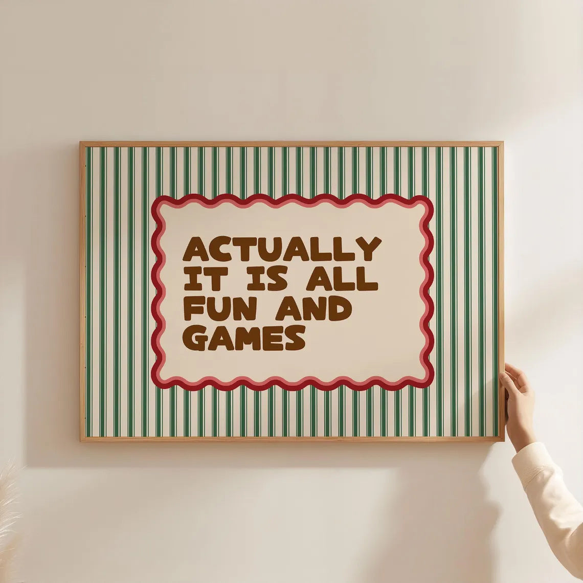 Actually It Is All Fun and Games Canvas Wall Art, Retro Quote with Green Stripes and Red Border — artwork and room preview