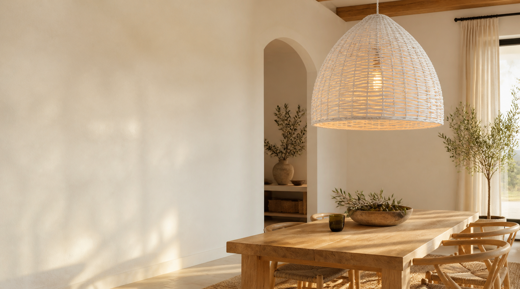 Warm rattan pendant light in a natural dining room
